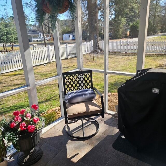 sunroom with plenty of natural light