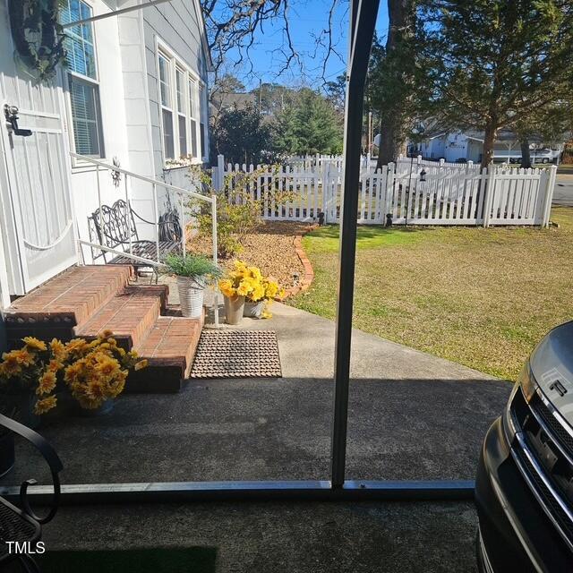 view of patio / terrace with fence