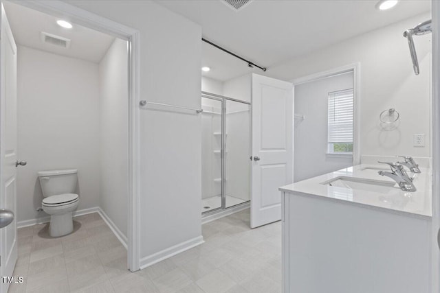 full bathroom featuring toilet, a shower stall, visible vents, and vanity