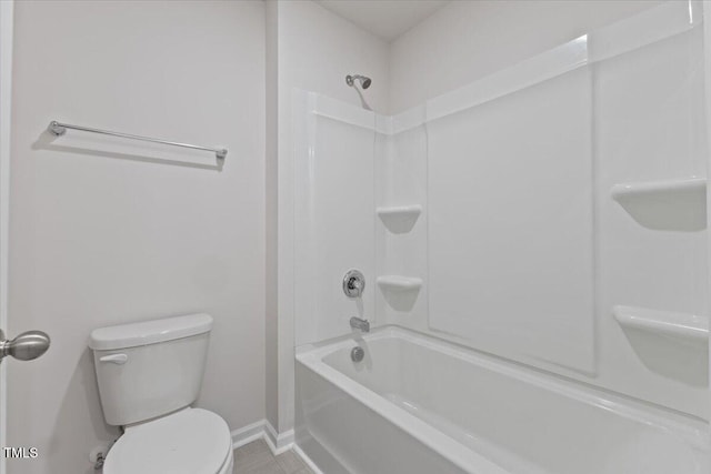 full bath with baseboards and toilet