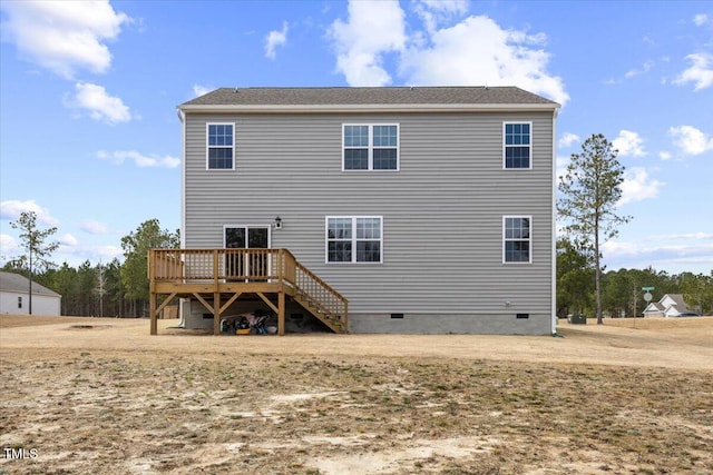 back of house with stairway, crawl space, and a deck