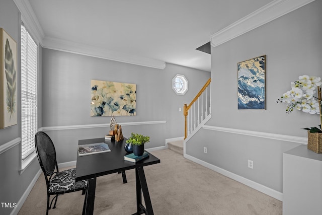 carpeted office space featuring baseboards and ornamental molding