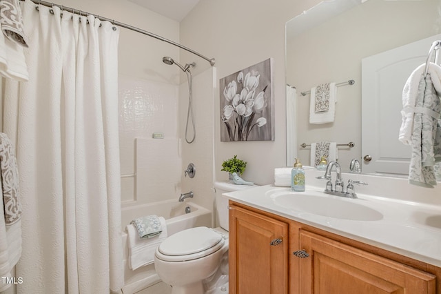 bathroom with vanity, toilet, and shower / bath combo