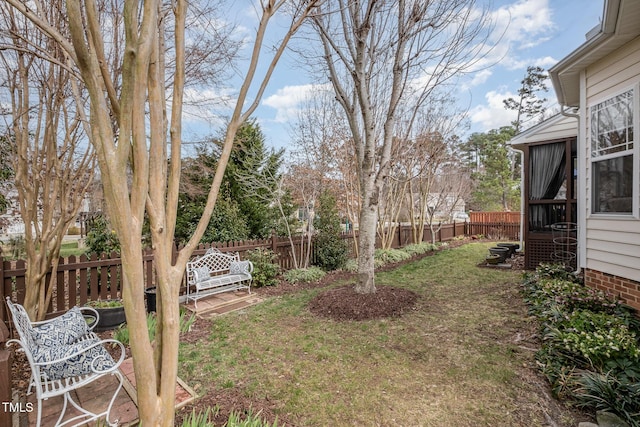 view of yard featuring a fenced backyard