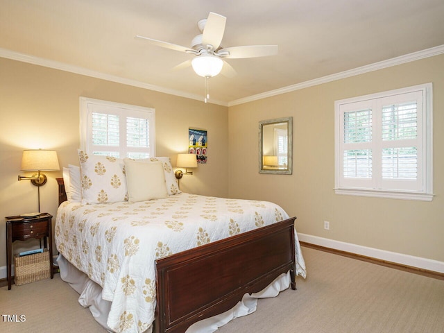 bedroom with multiple windows, baseboards, and ornamental molding