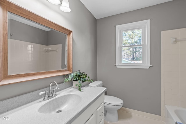 full bath featuring vanity, toilet, baseboards, and tile patterned flooring