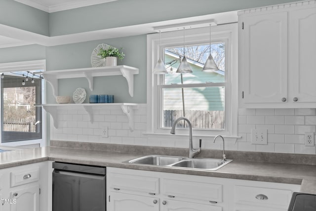 kitchen featuring a sink, open shelves, tasteful backsplash, white cabinetry, and crown molding