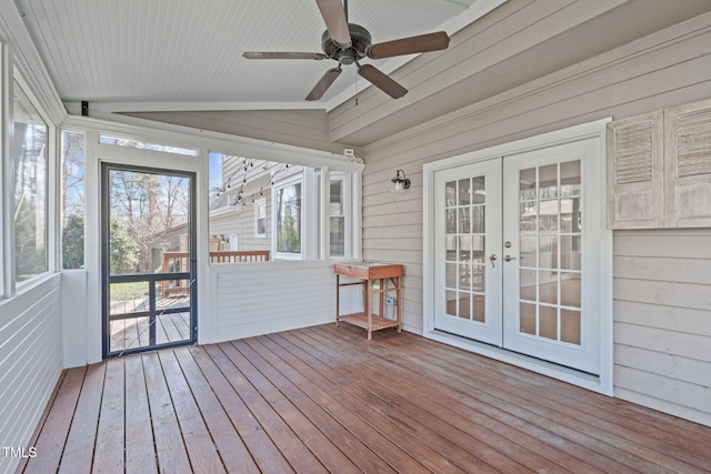 unfurnished sunroom with french doors, lofted ceiling, and a ceiling fan