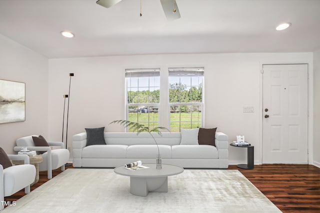 living room with recessed lighting, dark wood-style flooring, ceiling fan, and baseboards