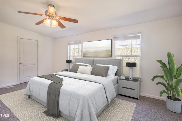 bedroom with ceiling fan, lofted ceiling, visible vents, baseboards, and carpet