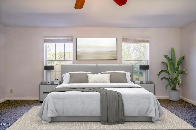 bedroom featuring ceiling fan, baseboards, and carpet flooring