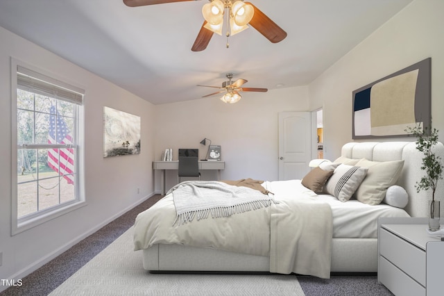 bedroom featuring a ceiling fan, carpet, and baseboards