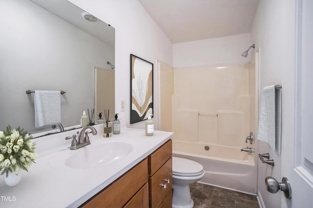 bathroom with toilet, shower / bathing tub combination, and vanity