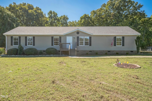 single story home with crawl space and a front lawn