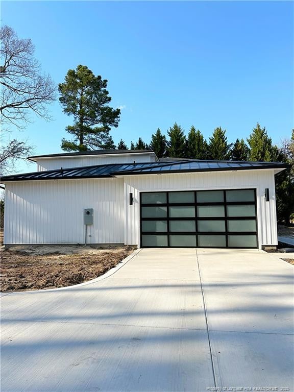 garage featuring driveway