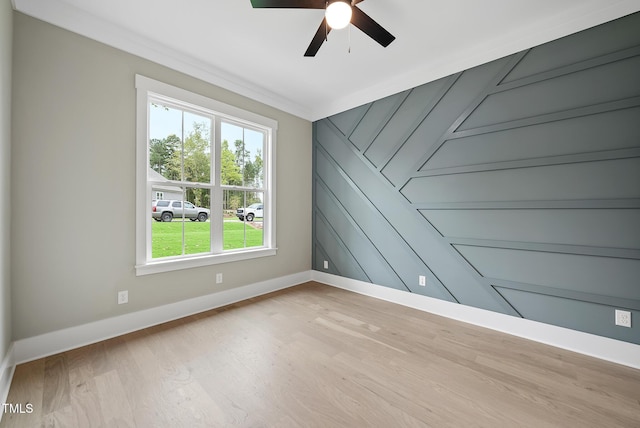 unfurnished room with light wood-style flooring, baseboards, and ceiling fan