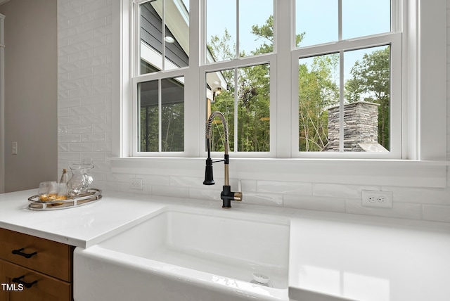 room details with light countertops and a sink