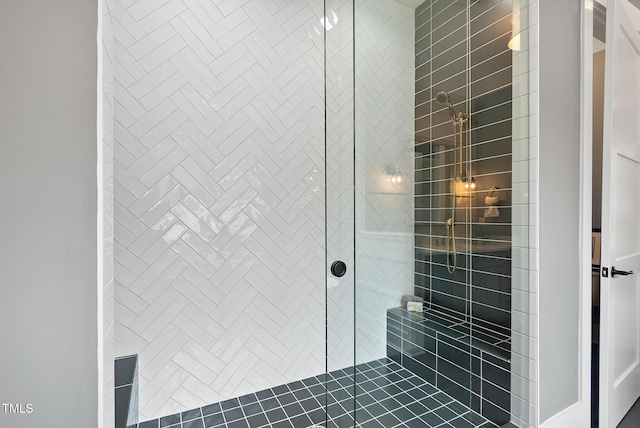 full bathroom featuring a tile shower