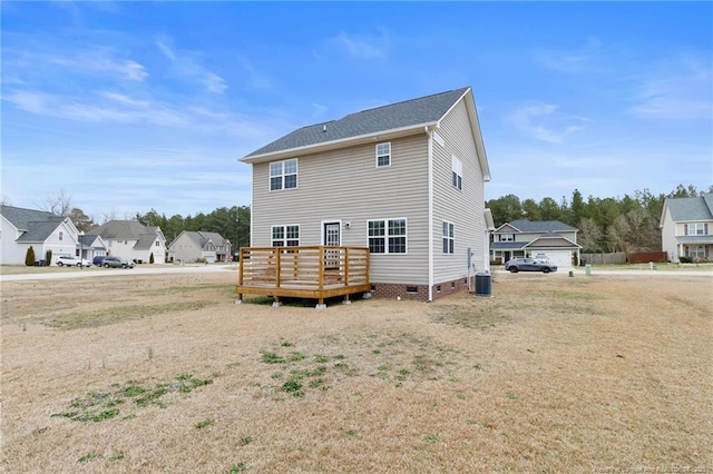 rear view of house featuring central AC unit, crawl space, and a wooden deck