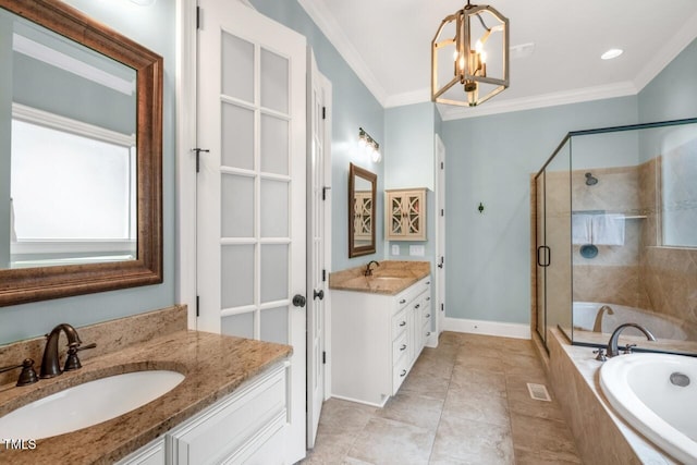 full bathroom featuring baseboards, ornamental molding, a sink, a shower stall, and a garden tub