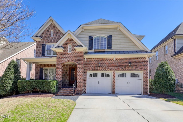 traditional home featuring a standing seam roof, concrete driveway, brick siding, and metal roof