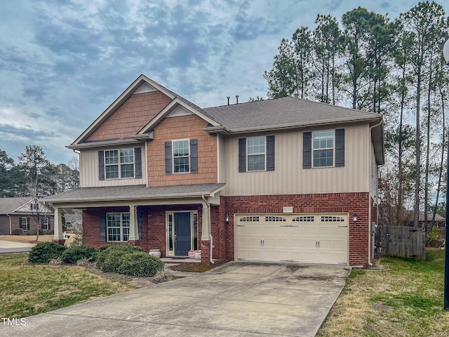 craftsman-style home featuring concrete driveway, an attached garage, fence, and brick siding