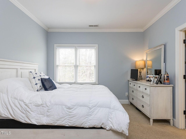 bedroom with visible vents, light colored carpet, baseboards, and ornamental molding