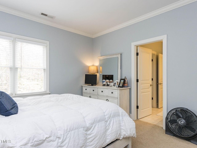 bedroom featuring ornamental molding, visible vents, and light carpet