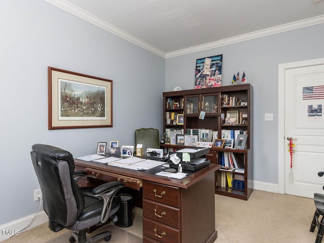 office featuring light colored carpet, crown molding, and baseboards