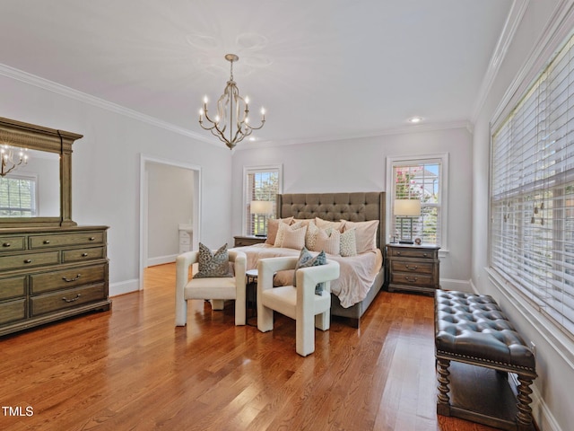 93 Shoreline Dr, Princeton, NC 27569 - bedroom with an inviting chandelier, light wood-style flooring, and crown molding