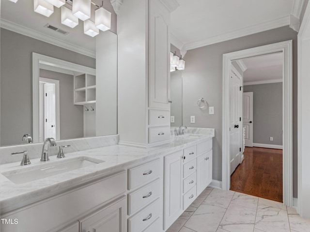 93 Shoreline Dr, Princeton, NC 27569 - bathroom with marble finish floor, ornamental molding, and a sink