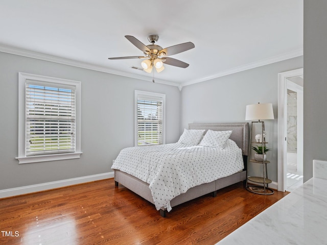 93 Shoreline Dr, Princeton, NC 27569 - bedroom featuring a ceiling fan, crown molding, wood finished floors, and baseboards