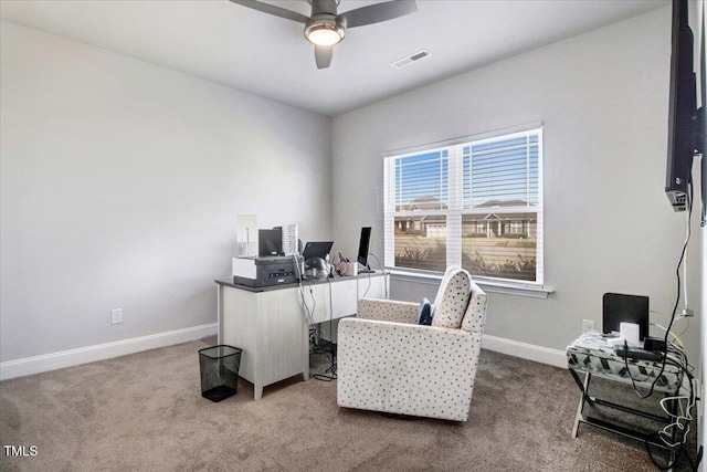 office space with visible vents, baseboards, and carpet