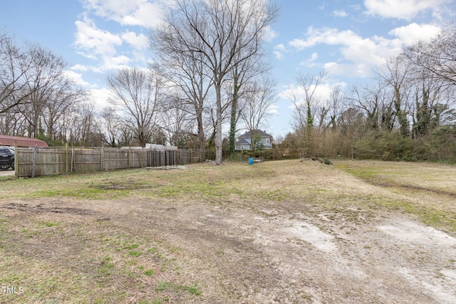 view of yard with fence