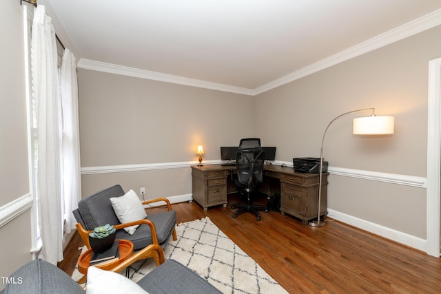 office featuring dark wood-type flooring, baseboards, and ornamental molding