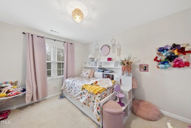 bedroom with carpet, visible vents, and baseboards