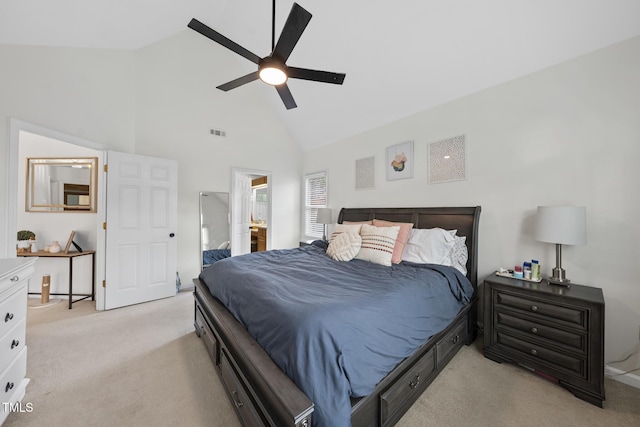 bedroom featuring visible vents, connected bathroom, ceiling fan, light colored carpet, and high vaulted ceiling