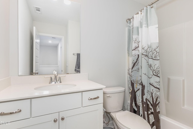 bathroom featuring visible vents, toilet, vanity, and shower / bathtub combination with curtain