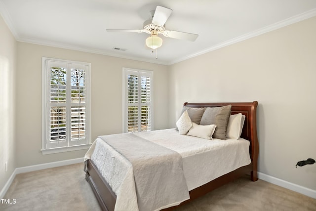 bedroom with visible vents, multiple windows, and carpet flooring