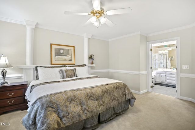 bedroom featuring ornamental molding, ensuite bath, baseboards, and carpet floors