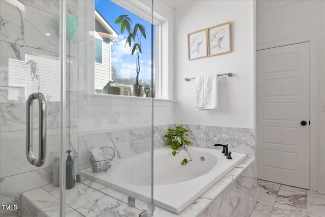 full bath with a marble finish shower, marble finish floor, and a bath