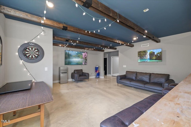 living room featuring beam ceiling, baseboards, visible vents, and concrete flooring