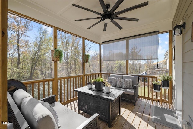 sunroom / solarium with ceiling fan