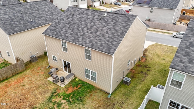 birds eye view of property with a residential view