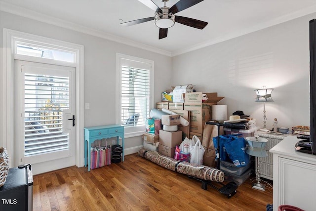 interior space with ceiling fan