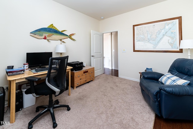 office space with baseboards and carpet floors