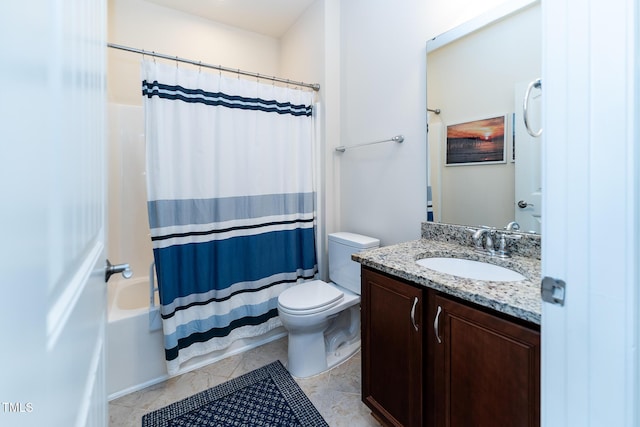 full bath with tile patterned floors, shower / tub combo with curtain, toilet, and vanity