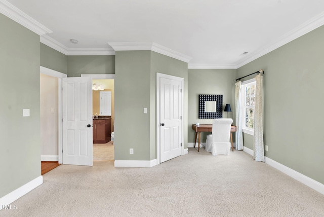 unfurnished bedroom featuring light colored carpet, baseboards, and ornamental molding