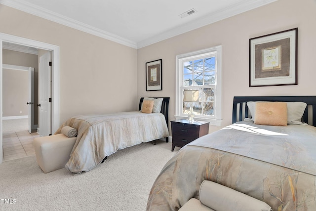 bedroom with light carpet, visible vents, and crown molding