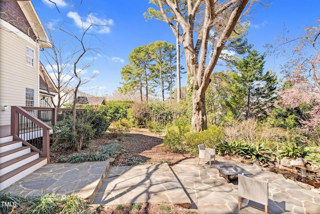 view of patio featuring a deck